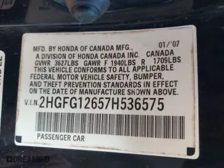 2007 Honda Civic Cpe LX with VIN 2HGFG12657H536575, listed as a IAAI auction lot 41774288 with 221,792 mi miles. Bid and sale history available at carsss.com. Image 9.