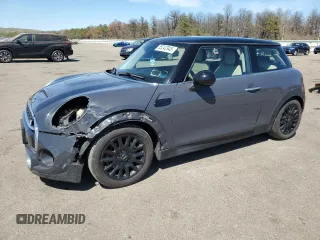 2014 MINI Hardtop S with VIN WMWXM7C54ET985344, listed as a Copart auction lot 55242945 with 87,017 mi miles and Salvage Title. Bid and sale history available at DreamBid. Image 1.