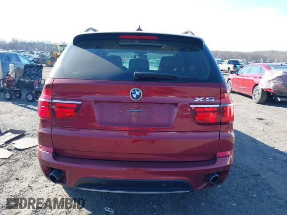 2011 BMW X5 35i with VIN 5UXZV4C52BL413125, listed as a IAAI auction lot 41697824 with 136,828 mi miles. Bid and sale history available at carsss.com. Image 16.