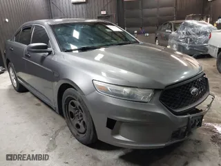 2015 Ford Sedan Police Interceptor with VIN 1FAHP2MK4FG119536, listed as a IAAI auction lot 41635340 with 165,322 mi miles. Bid and sale history available at carsss.com. Image 1.