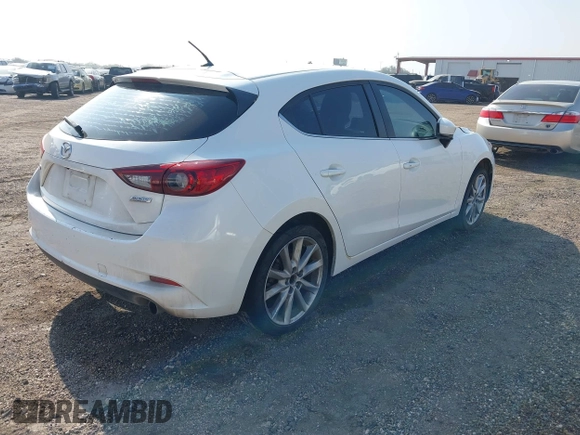 2017 Mazda 3 Touring with VIN 3MZBN1L77HM157118, listed as a IAAI auction lot 41734627 with 132,452 mi miles and . Bid and sale history available at DreamBid. Image 4.