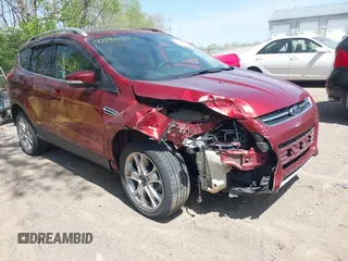 2015 Ford Escape Titanium z VIN 1FMCU0J92FUA38616, wystawiony jako IAAI lot #42136816 z przebiegiem 131 941 mil mil oraz . Historia ofert i sprzedaży dostępna na DreamBid. Obrazek 1.
