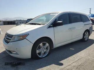 2012 Honda Odyssey Touring с VIN 5FNRL5H90CB118652, выставлен на аукционе Copart как лот 59056575 с пробегом 82 833 миль миль и Списание • Salvage title. История ставок и продаж доступна на DreamBid. Изображение 1.