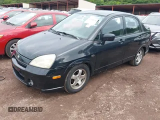 2004 Suzuki Aerio S z VIN JS2RA61S045207428, wystawiony jako IAAI lot #42340536 z przebiegiem 83 056 mil mil oraz . Historia ofert i sprzedaży dostępna na DreamBid. Obrazek 2.