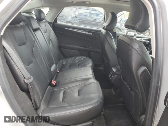 2016 Ford Fusion Titanium with VIN 3FA6P0K99GR319253, listed as a Copart auction lot 51935965 with 186,717 mi miles and Salvage Title. Bid and sale history available at DreamBid. Image 10.
