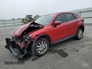 2016 Mazda CX-5 Sport with VIN JM3KE4BY1G0701197, listed as a Copart auction lot 61297625 with 138,166 mi miles and Salvage title. Bid and sale history available at DreamBid. Image 1.