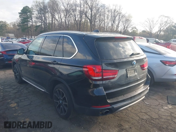 2014 BMW X5 sDrive35i with VIN 5UXKR2C50E0H31926, listed as a IAAI auction lot 41838021 with 125,813 mi miles. Bid and sale history available at carsss.com. Image 3.