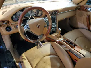 2006 Porsche 911 Carrera S with VIN WP0CB29946S765147, listed as a Copart auction lot 77937354 with 35,028 mi miles and Salvage Title. Bid and sale history available at carsss.com. Image 8.
