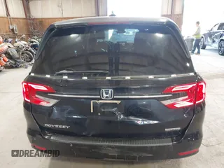 2021 Honda Odyssey Touring z VIN 5FNRL6H83MB028264, wystawiony jako IAAI lot #42206204 z przebiegiem 45 332 mil mil oraz . Historia ofert i sprzedaży dostępna na DreamBid. Obrazek 16.