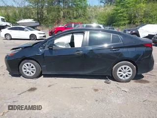 2022 Toyota Prius L Eco with VIN JTDKAMFU1N3182790, listed as a IAAI auction lot 41993264 with 124,777 mi miles and . Bid and sale history available at DreamBid. Image 13.