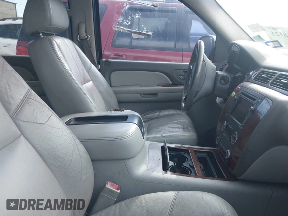 2008 Chevrolet Tahoe LTZ with VIN 1GNFC13JX8R277832, listed as a IAAI auction lot 41348121 with 210,576 mi miles and . Bid and sale history available at DreamBid. Image 5.