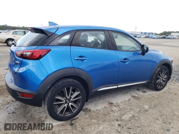 2016 Mazda CX-3 Grand Touring with VIN JM1DKBD72G0106104, listed as a Copart auction lot 52581085 with 76,603 mi miles and Salvage Title. Bid and sale history available at carsss.com. Image 3.