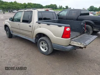 2005 Ford Explorer Sport Trac XLS with VIN 1FMZU77K65UA53244, listed as a IAAI auction lot 42375234 with 240,441 mi miles and . Bid and sale history available at DreamBid. Image 3.
