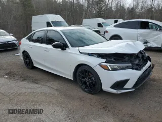 2022 Honda Civic Sport z VIN 2HGFE2F53NH119210, wystawiony jako Copart lot #51692345 z przebiegiem 58 785 mil mil oraz Szkoda całkowita • Salvage title. Historia ofert i sprzedaży dostępna na DreamBid. Obrazek 4.