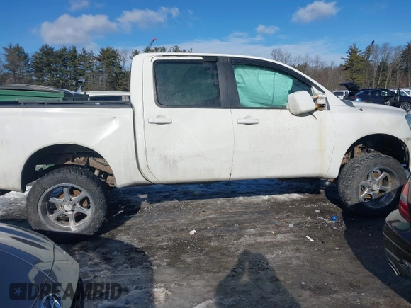 2012 Nissan Titan SV with VIN 1N6BA0EJ0CN309933, listed as a IAAI auction lot 41472091 with 147,635 mi miles. Bid and sale history available at carsss.com. Image 13.