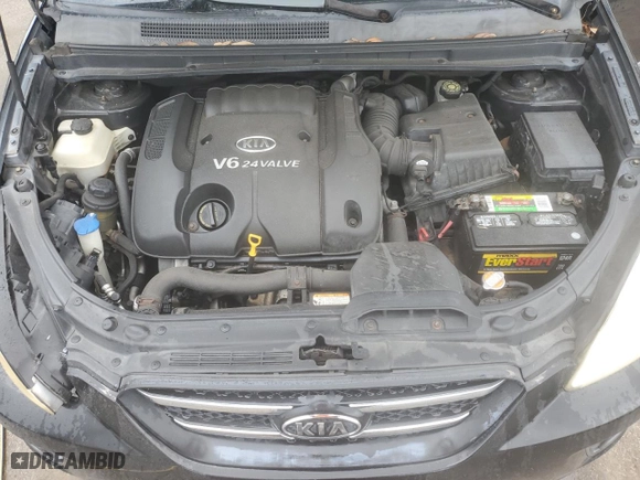 2007 Kia Rondo EX with VIN KNAFG526677042238, listed as a Copart auction lot 70869634 with 152,464 mi miles and Salvage Title. Bid and sale history available at carsss.com. Image 12.