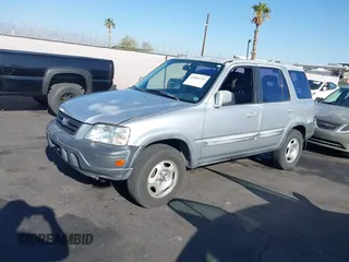 1999 Honda CR-V EX with VIN JHLRD1861XC007657, listed as a IAAI auction lot 42004759 with 180,078 mi miles. Bid and sale history available at carsss.com. Image 13.
