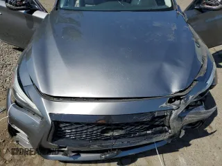 2014 Infiniti Q50 Premium z VIN JN1BV7AR1EM693471, wystawiony jako Copart lot #58991305 z przebiegiem 144 323 mil mil oraz Szkoda całkowita • Salvage title. Historia ofert i sprzedaży dostępna na DreamBid. Obrazek 11.
