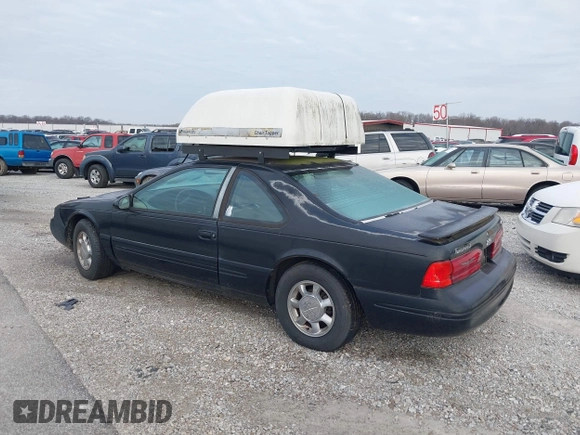 1997 Ford Thunderbird LX z VIN 1FALP62W9VH102330, wystawiony jako IAAI lot #41625557 z przebiegiem 48 826 mil mil oraz . Historia ofert i sprzedaży dostępna na DreamBid. Obrazek 3.