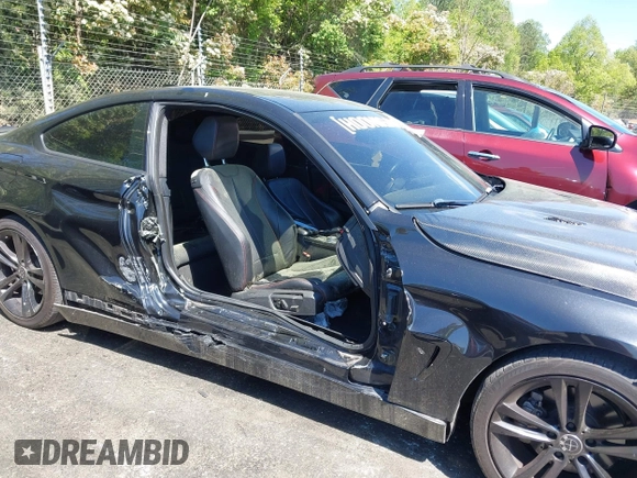 2015 BMW 4 Series 428i with VIN WBA3N7C54FK223490, listed as a IAAI auction lot 42033200 with 145,882 mi miles. Bid and sale history available at carsss.com. Image 13.