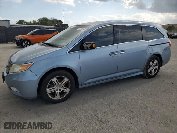 2013 Honda Odyssey Touring with VIN 5FNRL5H95DB067747, listed as a Copart auction lot 52769045 with 355,913 mi miles and Clean Title. Bid and sale history available at carsss.com. Image 1.