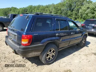 2000 Jeep Grand Cherokee Laredo with VIN 1J4GW48S2YC398116, listed as a Copart auction lot 61828385 with 251,791 mi miles and Clean title. Bid and sale history available at DreamBid. Image 3.