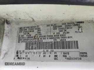 2001 Ford Econoline Cargo with VIN 1FTNE24241HB43552, listed as a IAAI auction lot 41957251 with Not Provided miles. Bid and sale history available at carsss.com. Image 9.