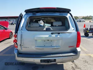 2010 GMC Yukon SLT with VIN 1GKUCCE01AR272822, listed as a IAAI auction lot 40572095 with 268,019 mi miles. Bid and sale history available at carsss.com. Image 16.