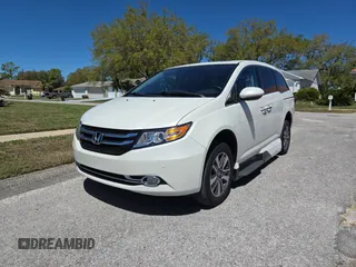 2017 Honda Odyssey Touring z VIN 5FNRL5H91HB008068, wystawiony jako Copart lot #49853805 z przebiegiem 33 521 mil mil oraz Czysty tytuł • Clean title. Historia ofert i sprzedaży dostępna na DreamBid. Obrazek 2.