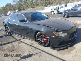 2014 Maserati Ghibli S Q4 z VIN ZAM57RTA9E1106695, wystawiony jako IAAI lot #40783416 z przebiegiem 92 885 mil mil oraz . Historia ofert i sprzedaży dostępna na DreamBid. Obrazek 1.