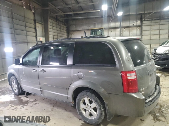 2010 Dodge Grand Caravan Hero with VIN 2D4RN3D14AR438334, listed as a Copart auction lot 45328305 with 151,521 mi miles and Salvage Title. Bid and sale history available at DreamBid. Image 2.