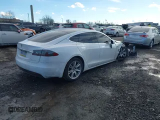 2021 Tesla Model S Long Range Plus with VIN 5YJSA1E20MF426400, listed as a IAAI auction lot 41453704 with Not provided miles and . Bid and sale history available at DreamBid. Image 4.