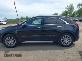 2020 Cadillac XT4 AWD Premium Luxury with VIN 1GYFZDR4XLF081159, listed as a IAAI auction lot 42337319 with 49,234 mi miles and . Bid and sale history available at DreamBid. Image 14.