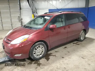 2010 Toyota Sienna XLE z VIN 5TDYK4CCXAS334481, wystawiony jako Copart lot #57750455 z przebiegiem 348 810 mil mil oraz Szkoda całkowita • Salvage title. Historia ofert i sprzedaży dostępna na DreamBid. Obrazek 1.