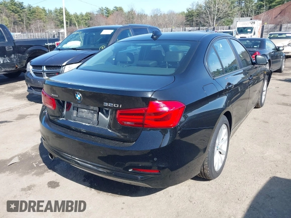2018 BMW 3 Series 320i xDrive with VIN WBA8A3C53JA489544, listed as a IAAI auction lot 41948325 with 68,322 mi miles and . Bid and sale history available at DreamBid. Image 4.