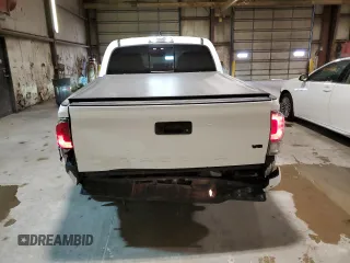 2023 Toyota Tacoma SR z VIN 3TMCZ5AN0PM651386, wystawiony jako Copart lot #51158185 z przebiegiem 23 642 mil mil oraz Szkoda całkowita • Salvage title. Historia ofert i sprzedaży dostępna na DreamBid. Obrazek 6.