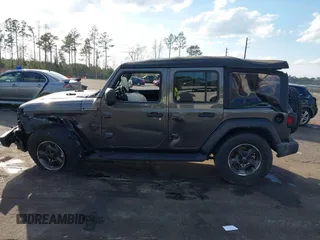 2022 Jeep Wrangler Unlimited Sport with VIN 1C4HJXDG1NW167066, listed as a IAAI auction lot 41572221 with 48,356 mi miles and . Bid and sale history available at DreamBid. Image 13.