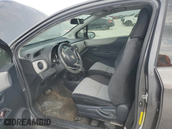 2013 Toyota Yaris L z VIN JTDJTUD33DD571231, wystawiony jako Copart lot #75826024 z przebiegiem 224 036 mil mil oraz Szkoda całkowita • Salvage title. Historia ofert i sprzedaży dostępna na DreamBid. Obrazek 7.