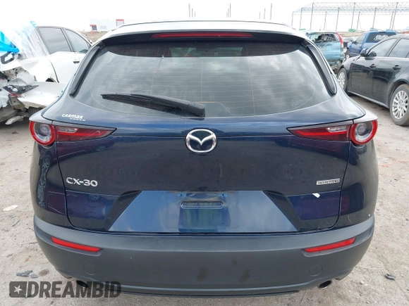 2021 Mazda CX-30 S with VIN 3MVDMAAL4MM302042, listed as a IAAI auction lot 42288275 with 39,821 mi miles and . Bid and sale history available at DreamBid. Image 17.