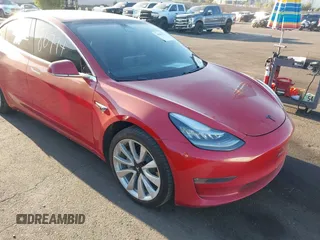 2018 Tesla Model 3 Long Range Battery with VIN 5YJ3E1EA3JF035785, listed as a IAAI auction lot 41986774 with 33,965 mi miles and . Bid and sale history available at DreamBid. Image 1.