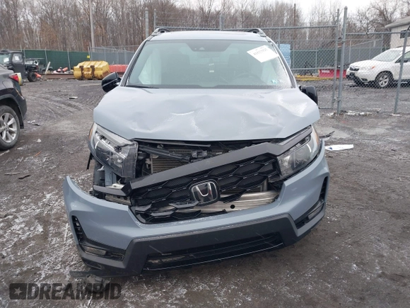 2022 Honda Passport Elite z VIN 5FNYF8H06NB015583, wystawiony jako IAAI lot #41633925 z przebiegiem 49 738 mil mil oraz . Historia ofert i sprzedaży dostępna na DreamBid. Obrazek 12.