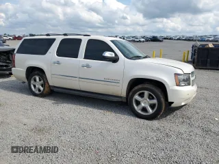 2012 Chevrolet Suburban LTZ with VIN 1GNSKKE7XCR288587, listed as a Copart auction lot 58721725 with 234,900 mi miles and Salvage title. Bid and sale history available at DreamBid. Image 4.