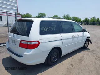2007 Honda Odyssey EX-L z VIN 5FNRL38717B400727, wystawiony jako IAAI lot #42247147 z przebiegiem 199 430 mil mil oraz . Historia ofert i sprzedaży dostępna na DreamBid. Obrazek 4.