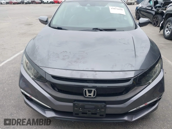 2020 Honda Civic LX with VIN 2HGFC2F63LH530442, listed as a IAAI auction lot 42071650 with 38,520 mi miles and . Bid and sale history available at DreamBid. Image 12.