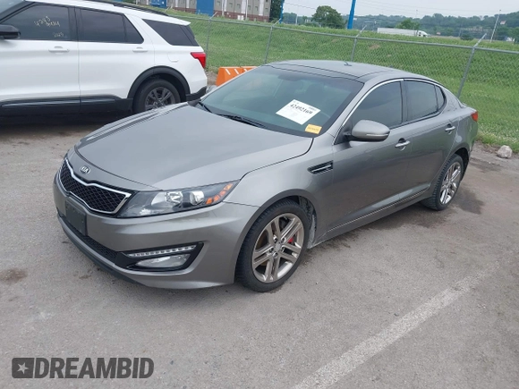 2013 Kia Optima SX with VIN 5XXGR4A62DG105805, listed as a IAAI auction lot 42492169 with 134,908 mi miles and . Bid and sale history available at DreamBid. Image 2.