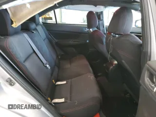 2016 Subaru WRX Premium z VIN JF1VA1E69G9828081, wystawiony jako Copart lot #63122085 z przebiegiem 52 984 mil mil oraz Szkoda całkowita • Salvage title. Historia ofert i sprzedaży dostępna na DreamBid. Obrazek 10.