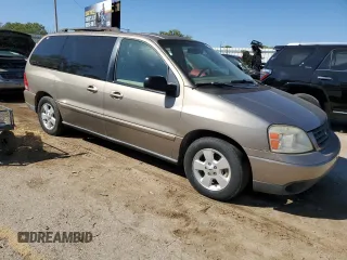2006 Ford Freestar SE z VIN 2FMZA51696BA52749, wystawiony jako Copart lot #73174604 z przebiegiem 288 365 mil mil oraz Szkody całkowita. Historia ofert i sprzedaży dostępna na DreamBid. Obrazek 4.