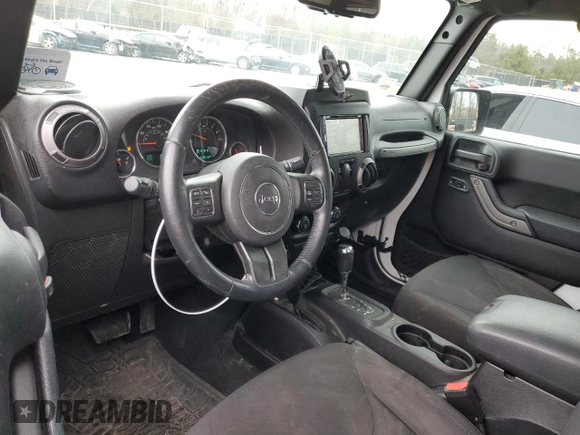 2015 Jeep Wrangler Sport with VIN 1C4AJWAG1FL525429, listed as a Copart auction lot 43033025 with 93,972 mi miles and Salvage title. Bid and sale history available at DreamBid. Image 8.