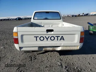 1990 Toyota Pickup with VIN JT4RN81R1L0049863, listed as a Copart auction lot 42832405 with 230,913 mi miles and Salvage title. Bid and sale history available at DreamBid. Image 6.