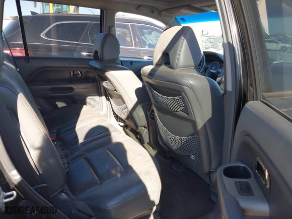 2007 Honda Pilot EX-L with VIN 5FNYF28557B003291, listed as a IAAI auction lot 41812795 with 191,493 mi miles. Bid and sale history available at carsss.com. Image 8.